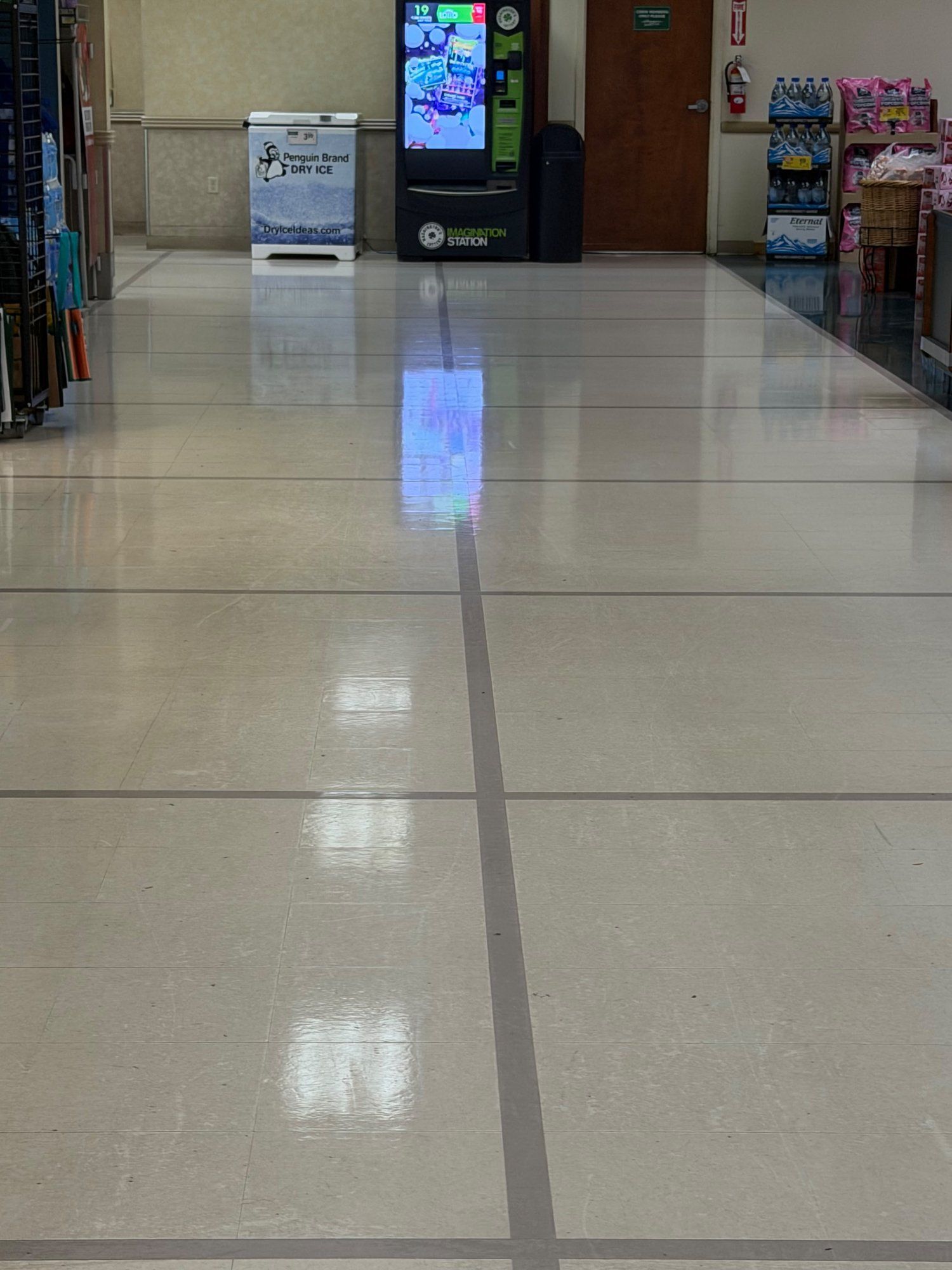 Freshly stripped and waxed vinyl tile floor with high-gloss finish